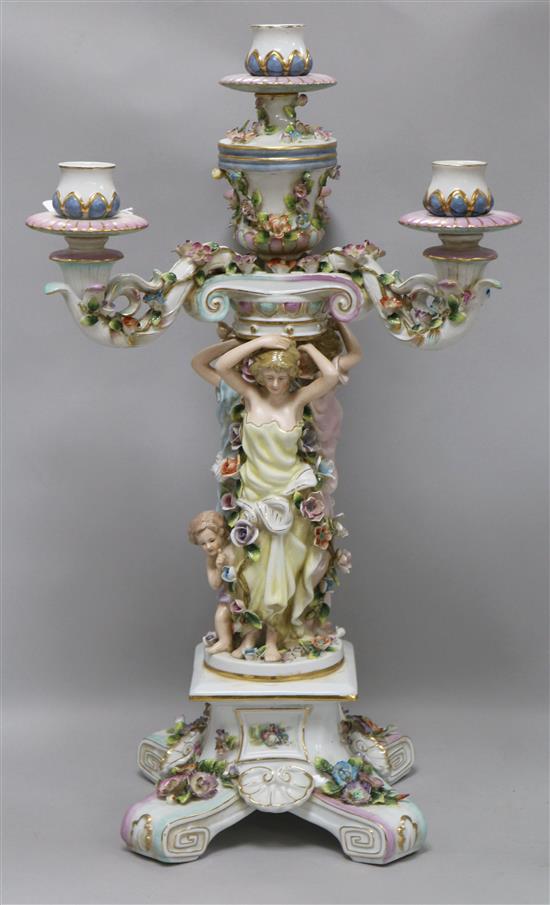 A German porcelain figural candelabrum H.62cm